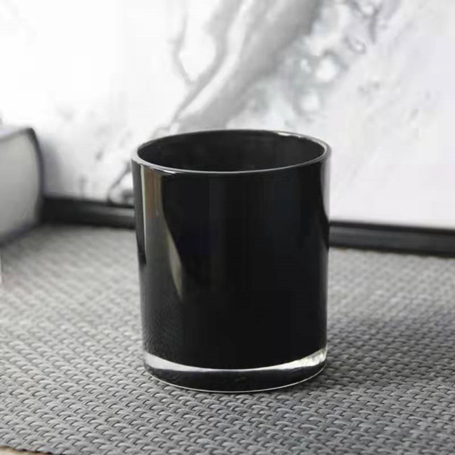 Luxuriöses, glänzendes Schwarz-Weiß-Kerzenglas